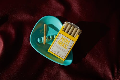 Free Yellow Box of Mom Grass Joints Stock Photo