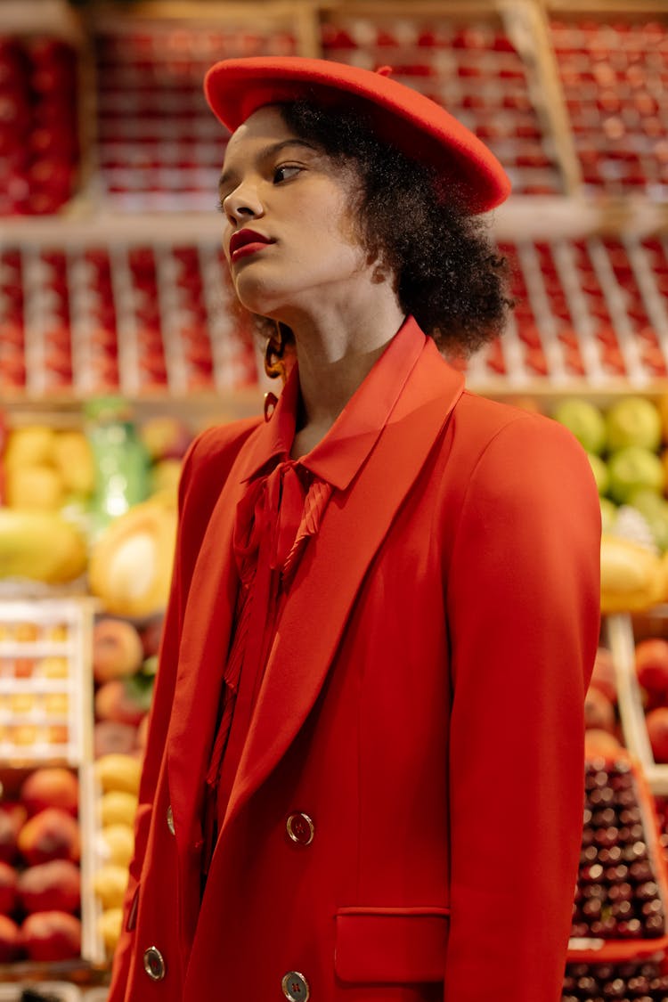 Woman In Red Suit And Beret On Market