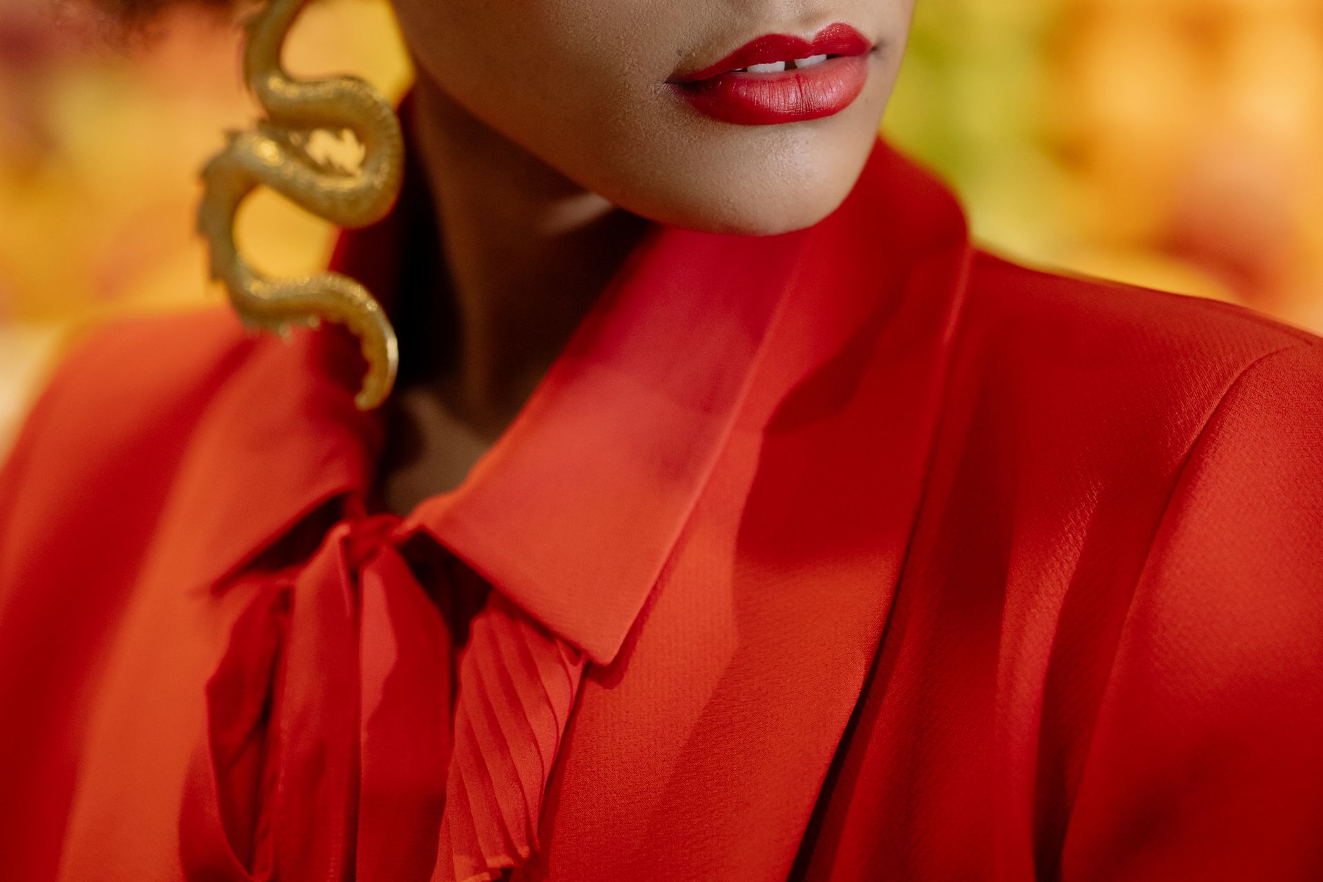 Photo of a Woman in a Red Collared Shirt