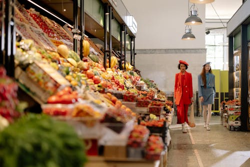Women Buying Fruits Inside the Grocery Store