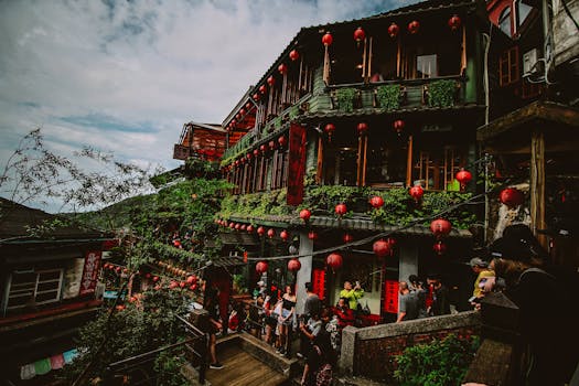 Explore Jiufen's vibrant streets with iconic red lanterns in New Taipei City, Taiwan.