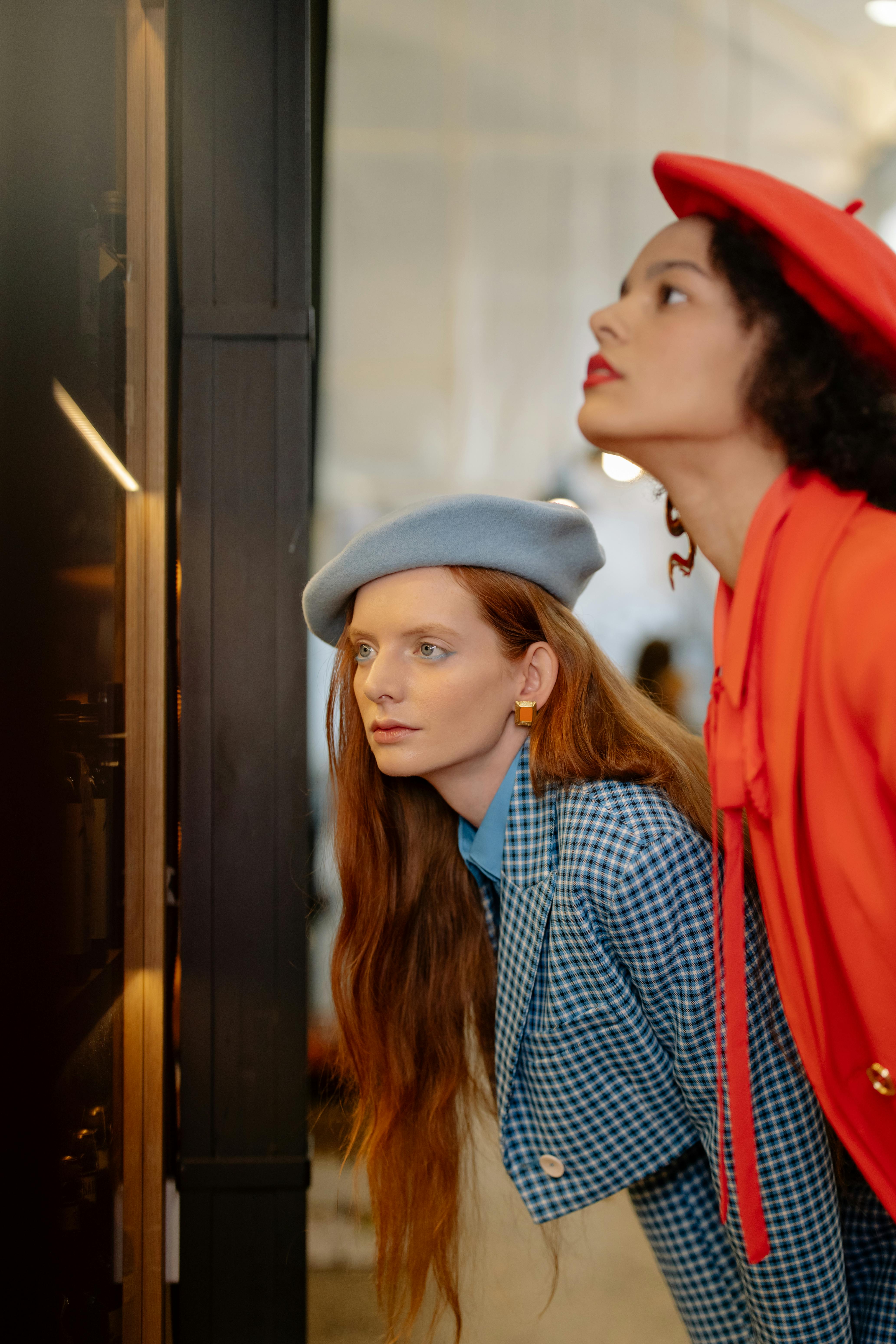 Women Showering Together While Wearing Beige Swimsuits · Free Stock Photo