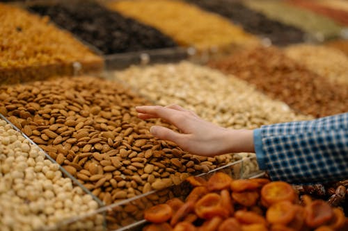 Free Displayed Assorted Nuts in the Store Stock Photo