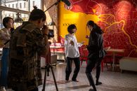 A Man and Woman Dancing Inside the Café