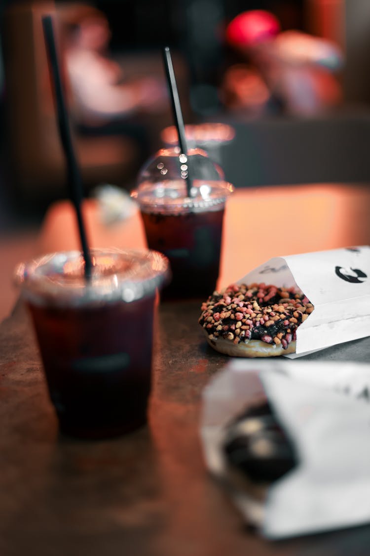 Coffee And Doughnuts On A Table