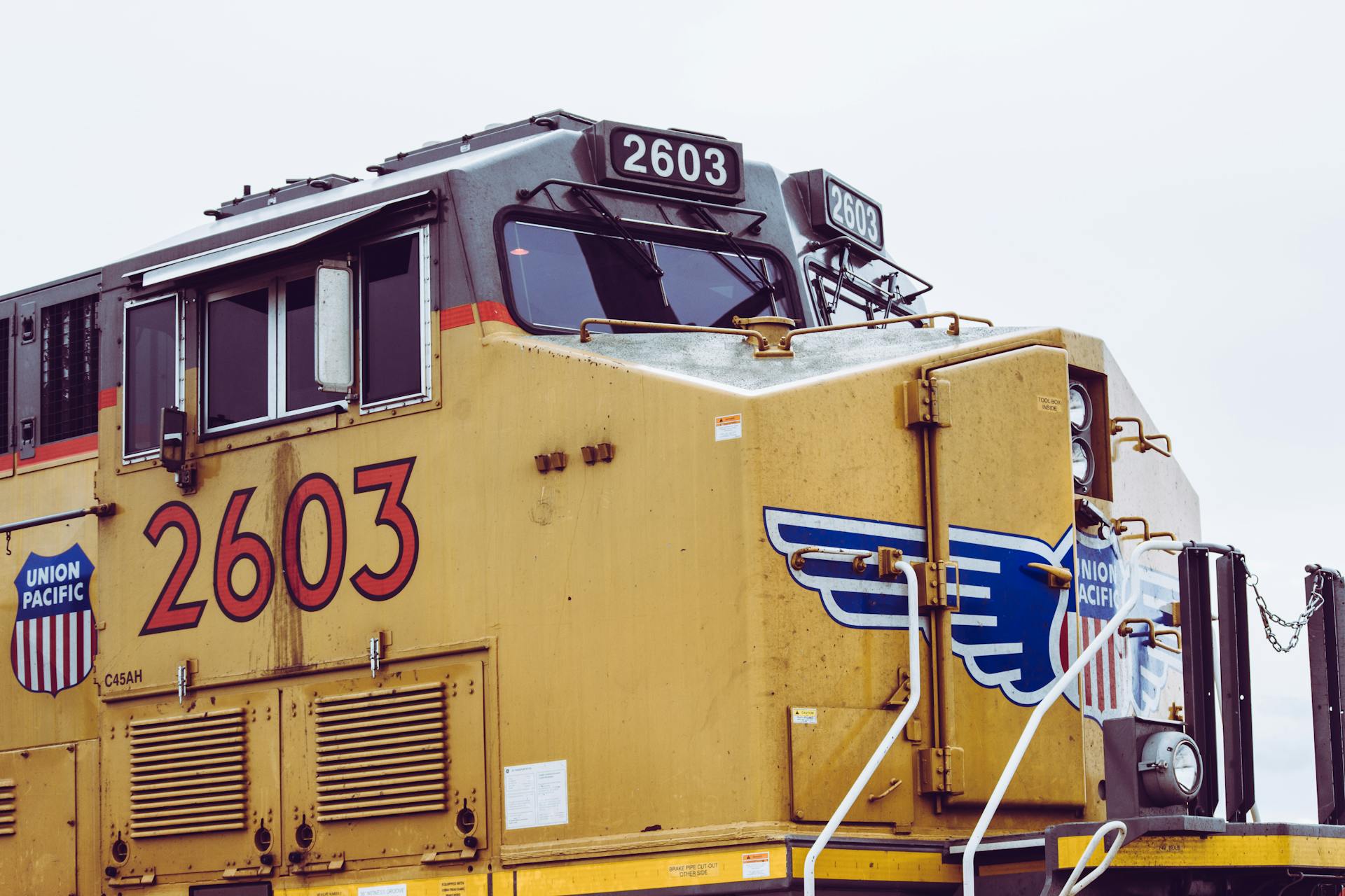 Detailed view of a Union Pacific freight train engine, highlighting number 2603.