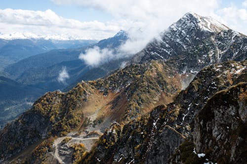 Безкоштовне стокове фото на тему «вершини, гірський хребет, гори» стокове фото