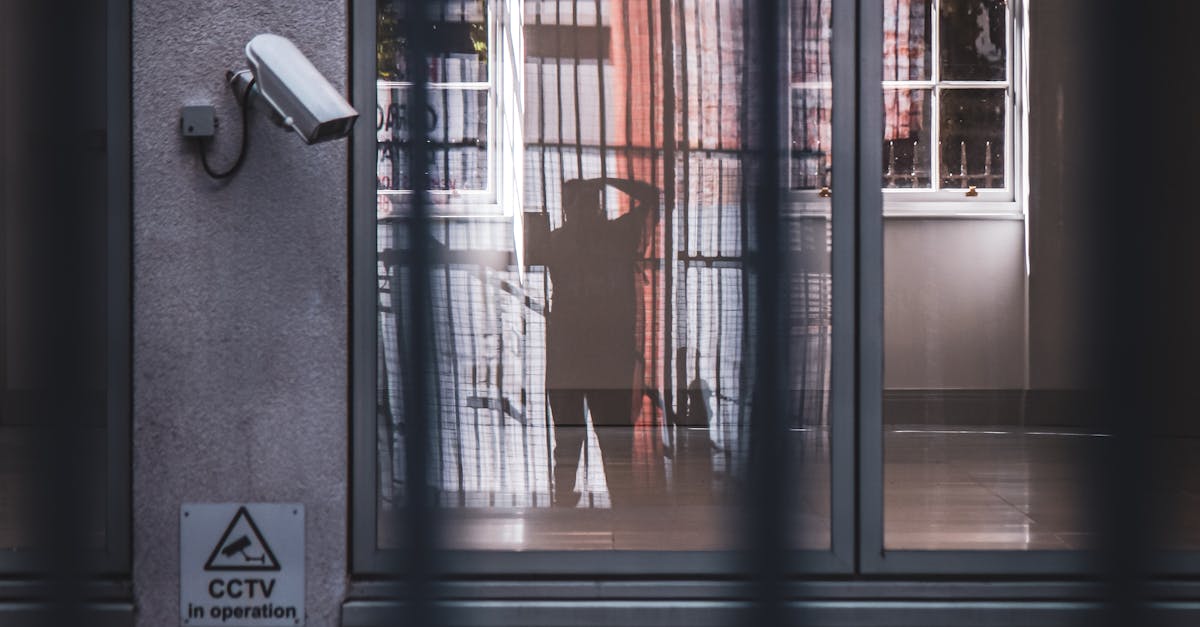 Reflection of standing man in window · Free Stock Photo