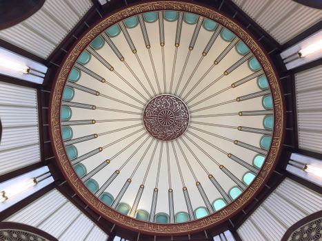 Explore the ornate Islamic dome architecture inside an Istanbul mosque.
