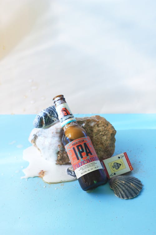 A Bottle of Beer on a Rock
