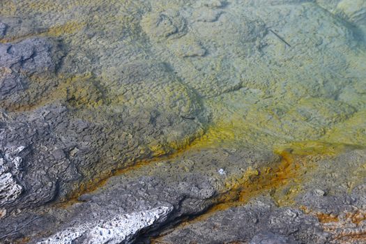 Water Waves on Gray and Yellow Concrete Floor