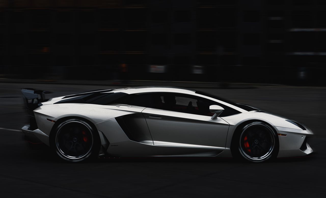 sleek lamborghini aventador in motion showcasing luxury and speed