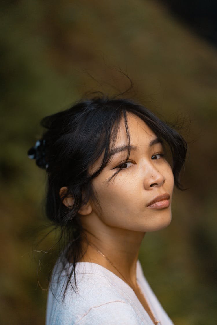 Young Asian Woman Looking With Pride