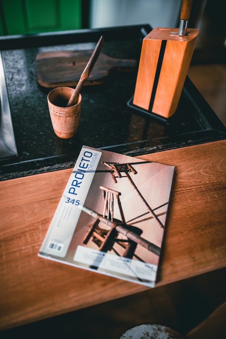 Magazine On A Wooden Table Top 