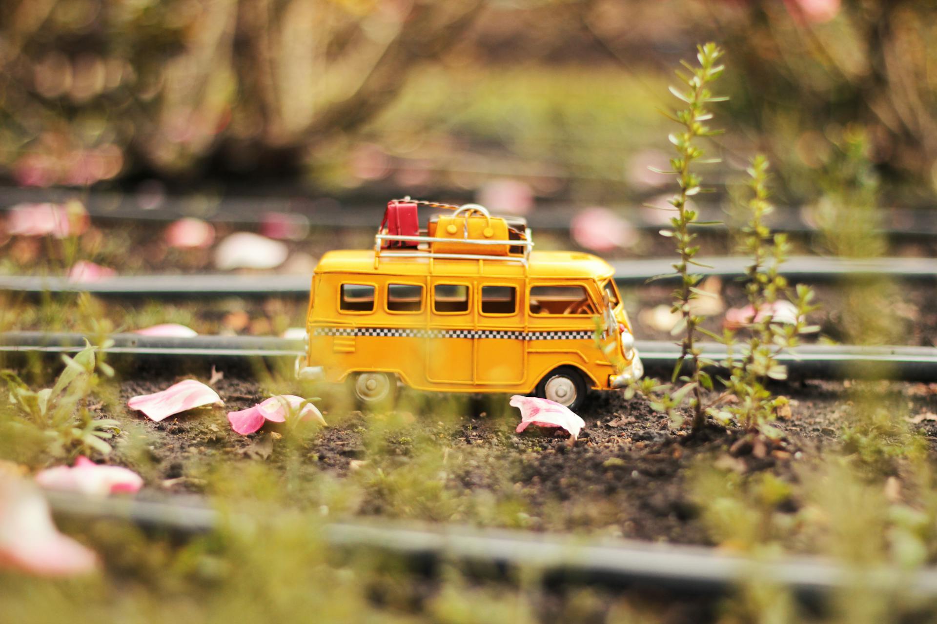 Tilt Shift and Selective Color Photo of White Van Miniature