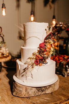 Decoration made of natural flowers for wedding cake