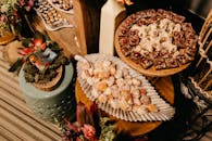 Cookies and delicacies presented on wooden plates