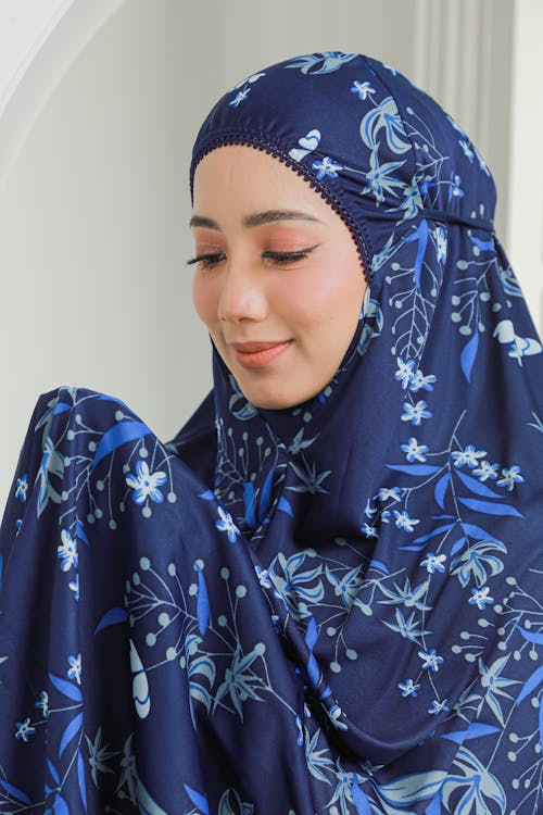Woman Wearing Blue Floral Hijab