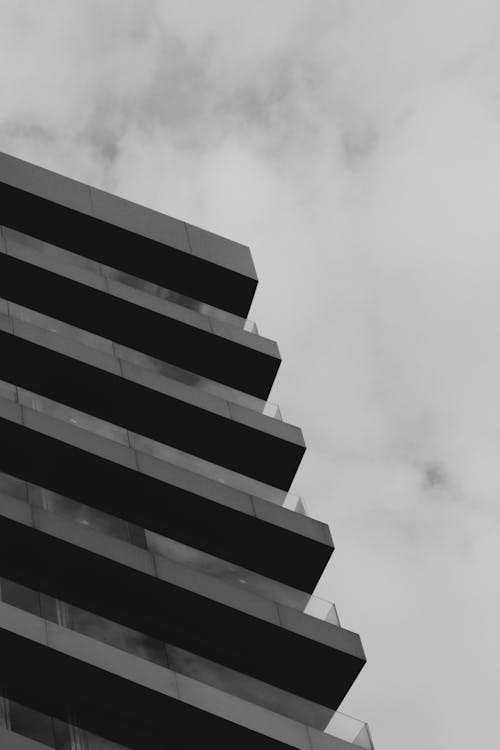 Grayscale Photograph of Building Balconies