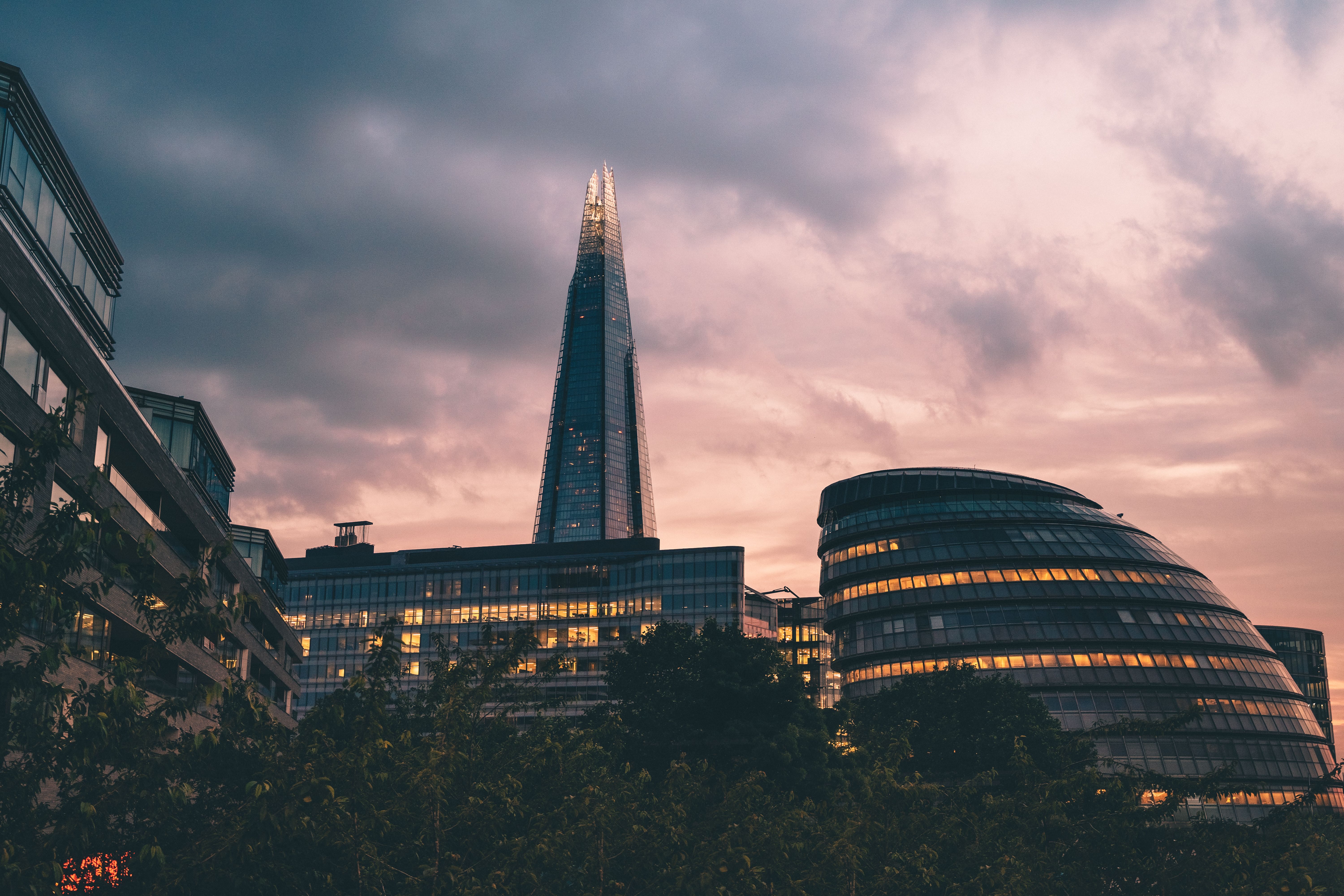 View of The Shard and cityscape in London during a dramatic sunset.