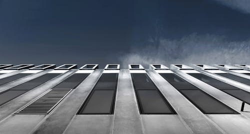 Low Angle of Grey Concrete Building