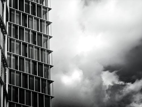 Free Grayscale Photo of Glass Building Stock Photo