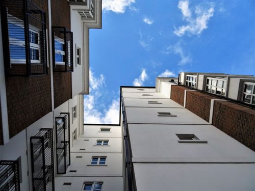 Free Low angle view of contemporary buildings and sky, showcasing urban architectural design. Stock Photo