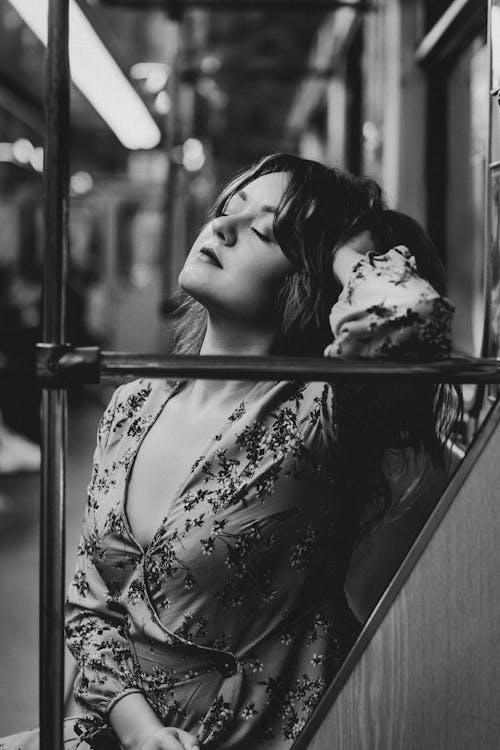 Monochrome Photo of Woman in Floral Dress Posing