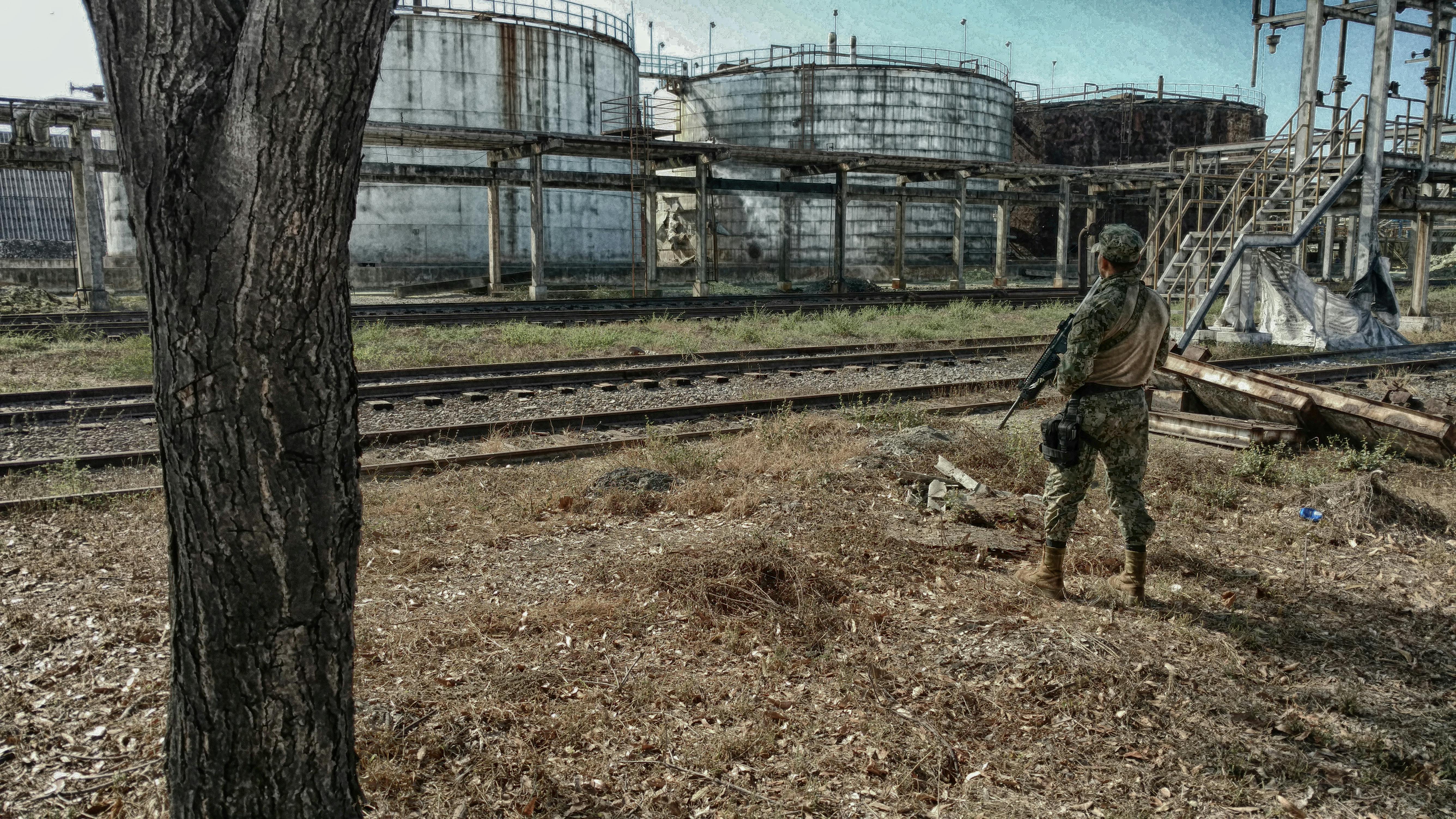 Free stock photo of abandoned, Industrial Tanks, soldier
