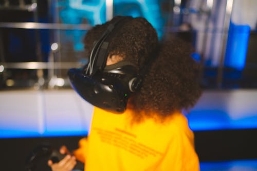 Close-Up Shot of a Kid Playing a Virtual Reality Game