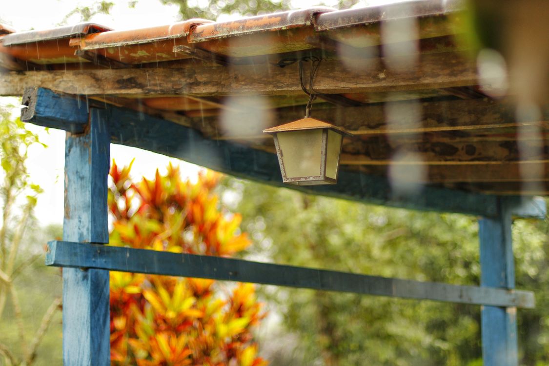 Lantern Hanging On Brown Wooden Ceiling