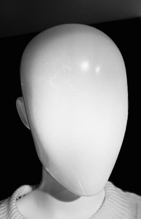 A creepy foam mannequin head that was used for cosmetology practice shot  from an upward angle Stock Photo - Alamy