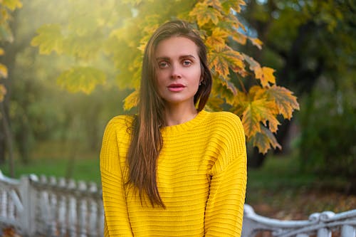 Woman in Yellow Sweater in Park