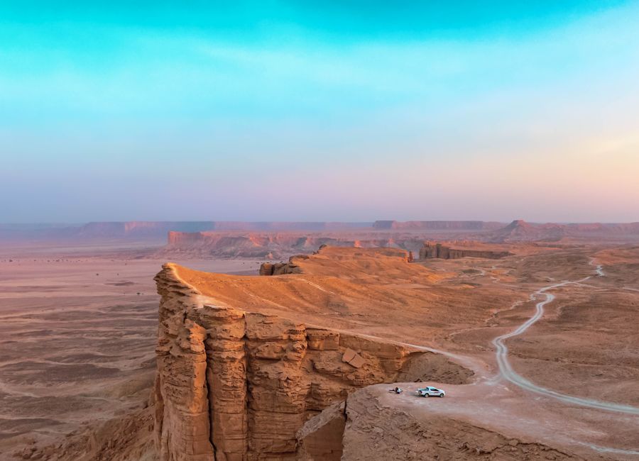 Stunning desert landscape at Edge of the World in Riyadh, Saudi Arabia during sunset.