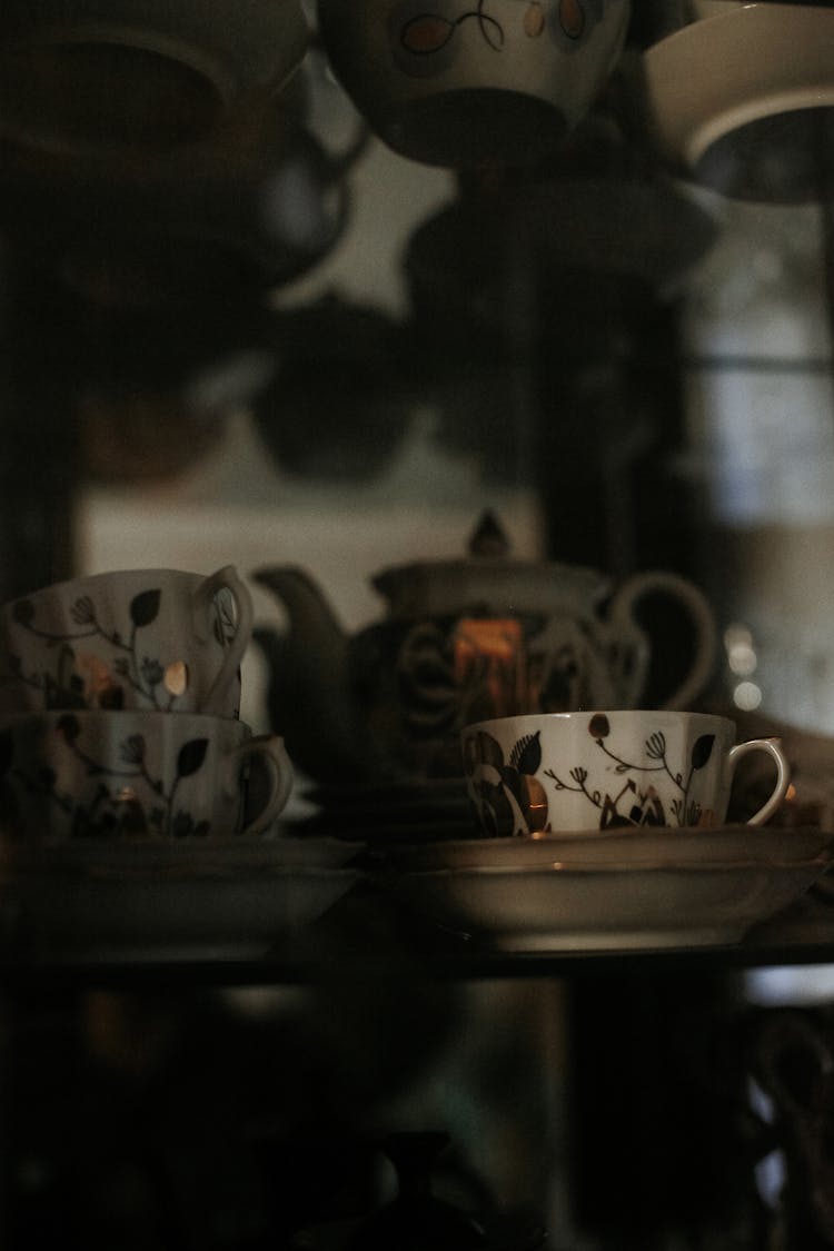 Retro Cups On Shelf In Cupboard