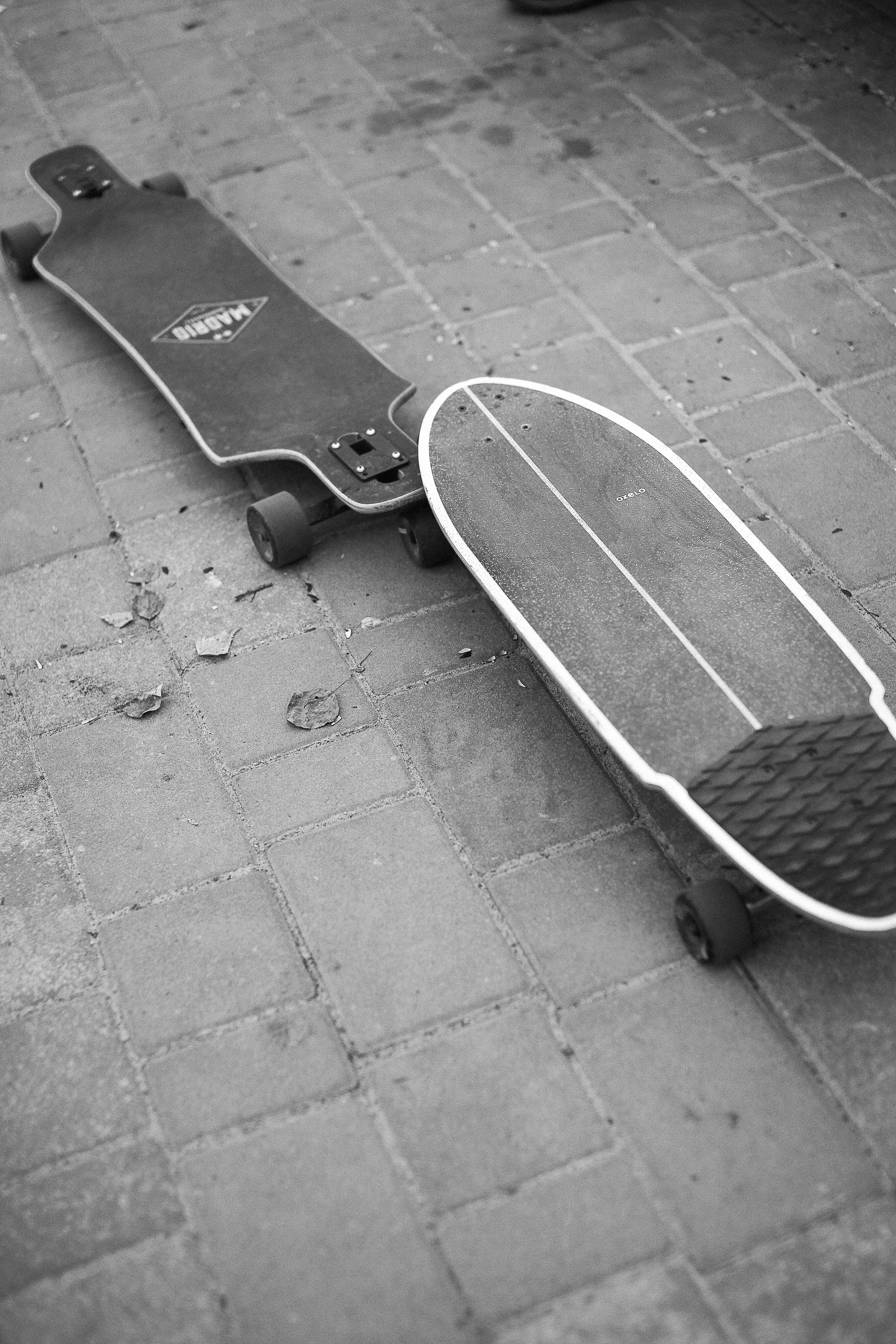 Skateboards on a Pavement · Free Stock Photo
