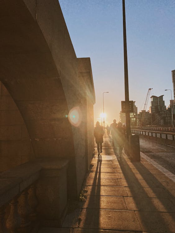 Free People Walking on the Sidewalk Stock Photo