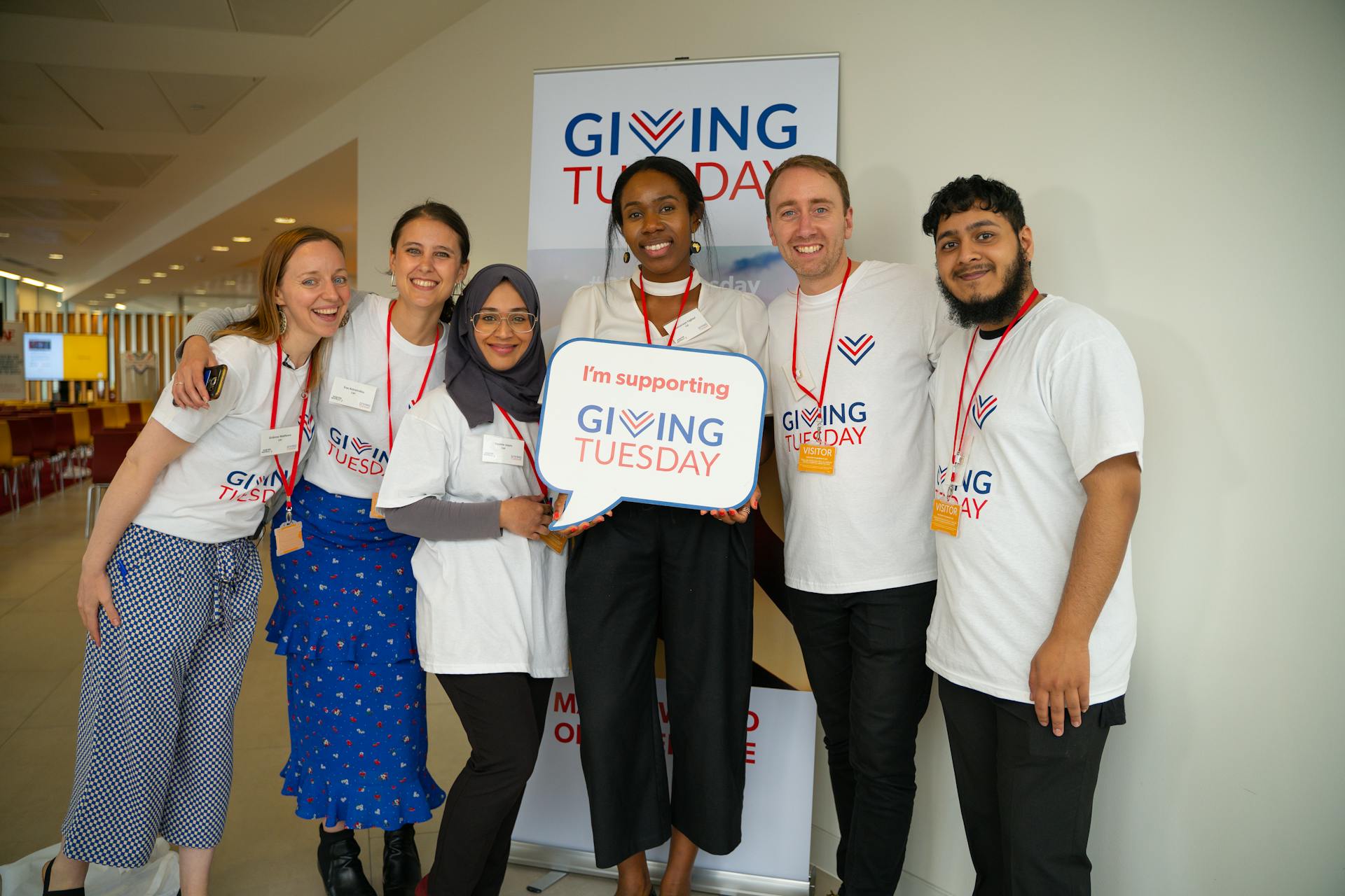 A group of activists posing to a picture at an event