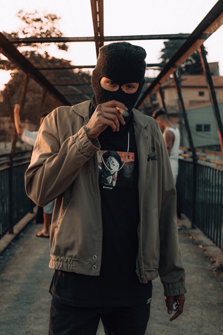 Man In Balaclava Smoking Cigar