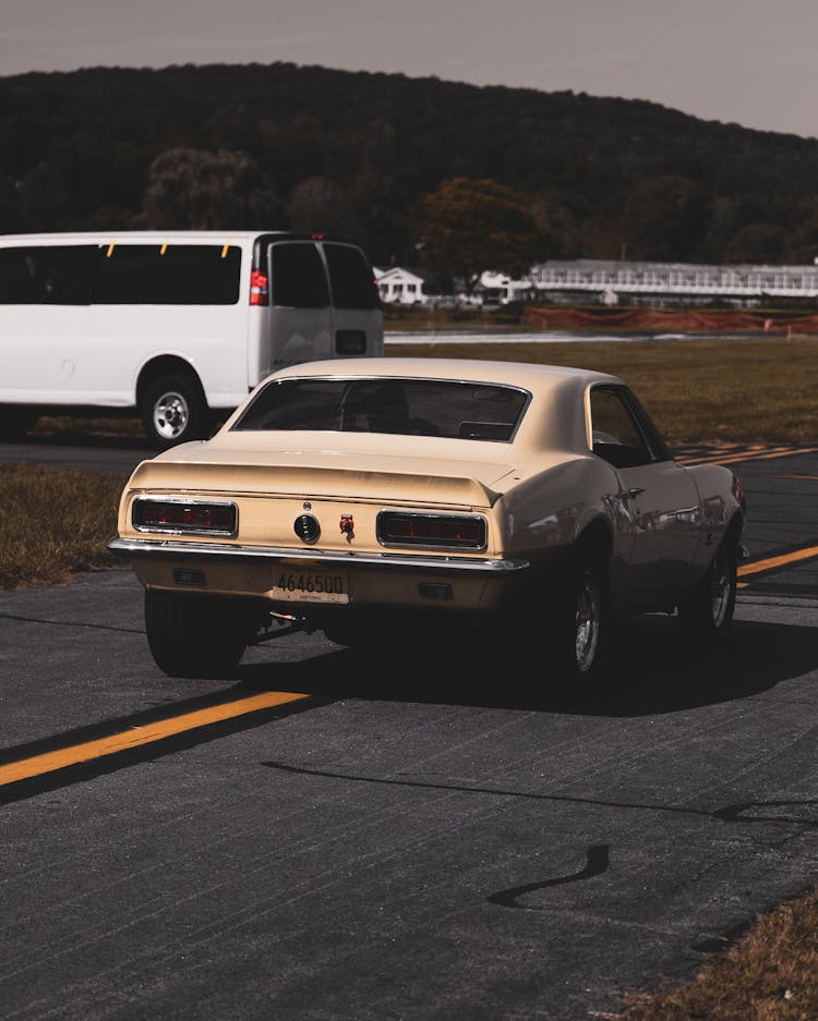 White Chevrolet Camaro On Road