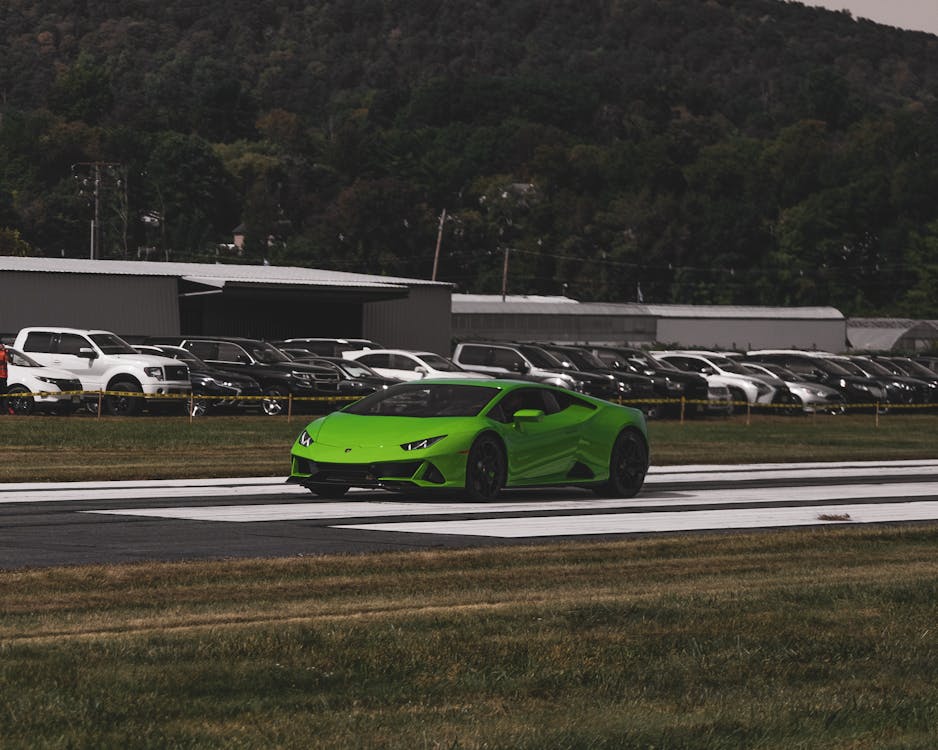 A Green Sports Car on Road