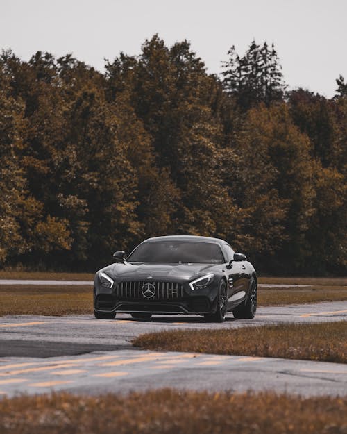 Free A Black Mercedes Benz Car on Road Stock Photo