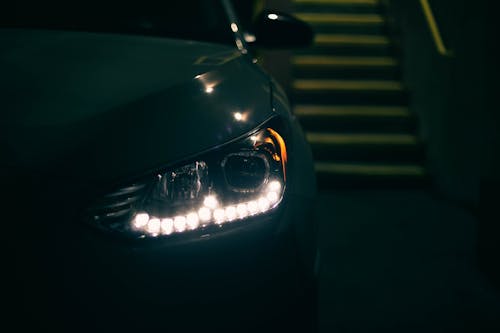 Free Close-Up Shot of Headlight of a Car Stock Photo