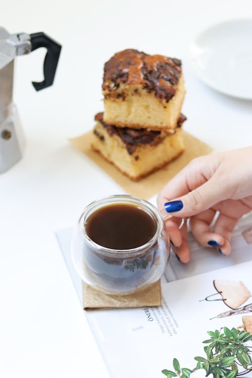 Free Person Holding a Transparent Mug With Coffee Stock Photo