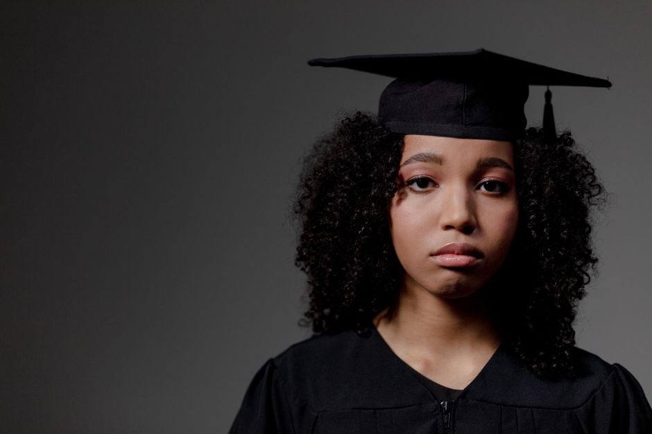young adult in a graduation gown - young adult health cover young adult in a graduation gown - young adult health cover