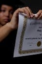 Graduate student destroying diploma