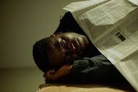 Workless man lying on side