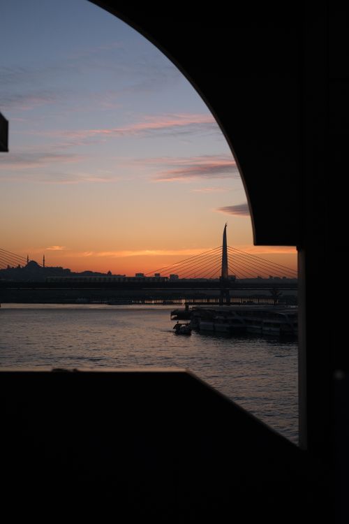 Free Beautiful sunset view over Golden Horn with city skyline silhouette in Istanbul, Turkey. Stock Photo