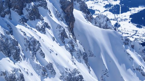 Free Breathtaking aerial view of snowcapped mountains in Oberösterreich, Austria during winter. Stock Photo