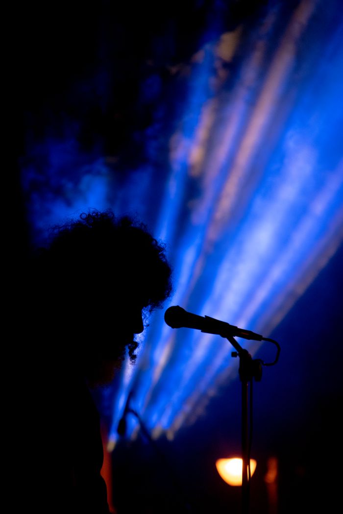 Stage haze cut by beams of concert light — photo by Athanasios Zoidis on Pexels